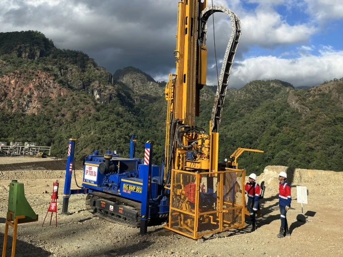 BMP Drill drilling rig operating in mountainous terrain